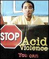 Woman victim showing a poster to stop acid violence